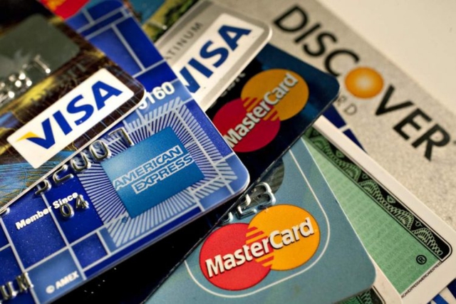 Cảnh giác rủi ro tiềm ẩn khi dùng thẻ thanh toán quốc tế: Tiện nhưng cũng dễ mất tiền - Ảnh 1.