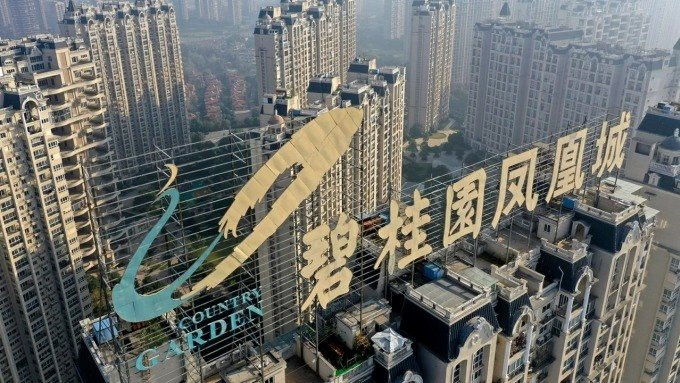 Thoát phá sản vào phút chót, cổ phiếu công ty bất động sản nổi tiếng Trung Quốc tăng 15%, lượng giao dịch đạt mức cao nhất mọi thời đại - Ảnh 1.