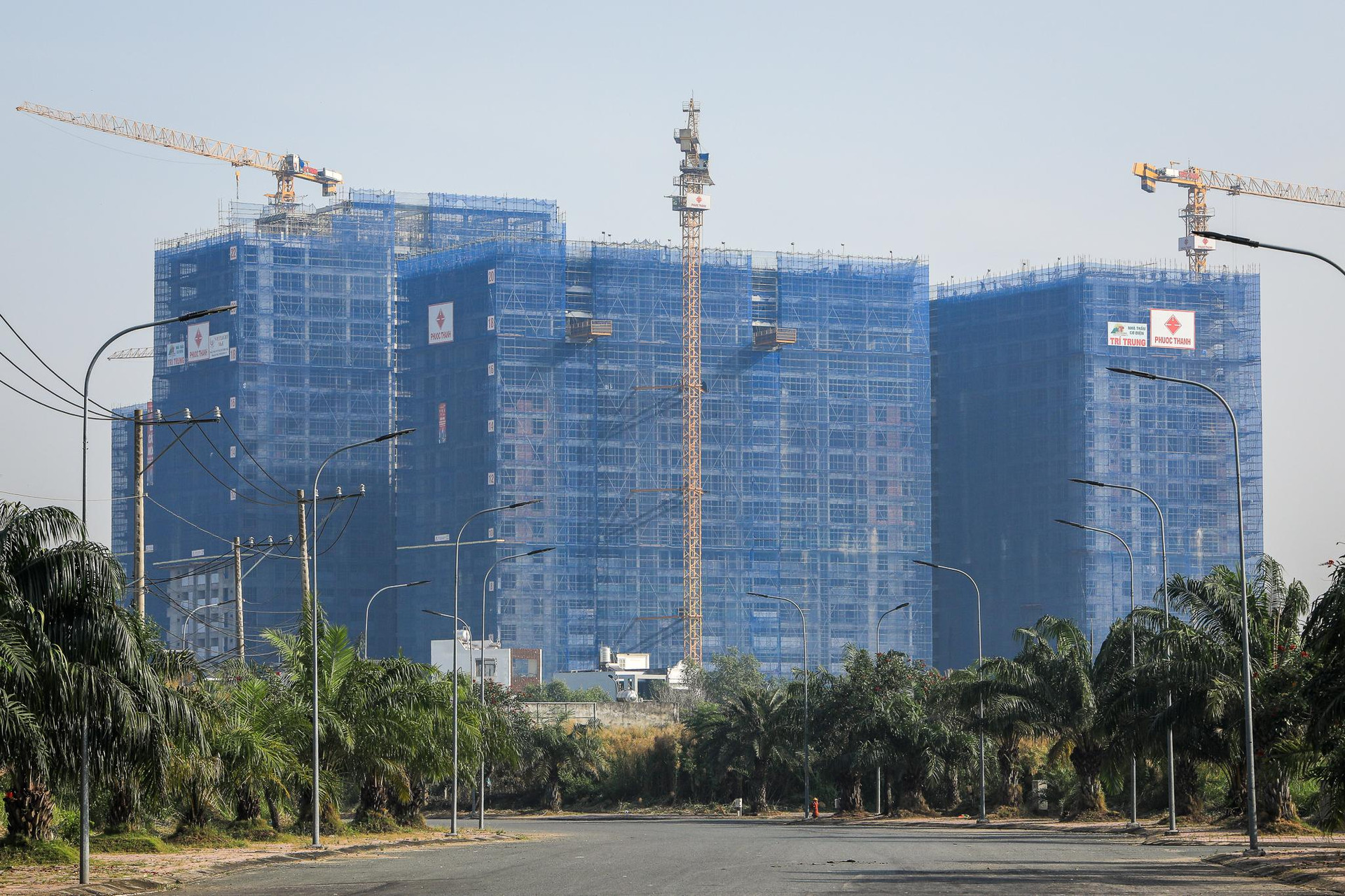 Hàng loạt dự án bất động sản nghìn tỷ dọc đường Vành đai 3 của TP.  HCM: Chung cư bình dân, biệt thự trống trải - Ảnh 7.